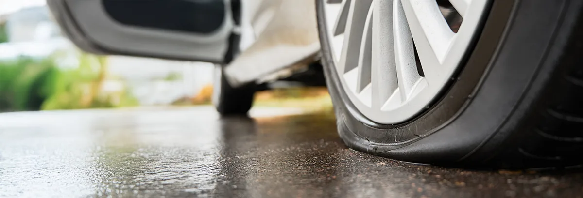 Flat Tires Always Pick the Worst Time on white background