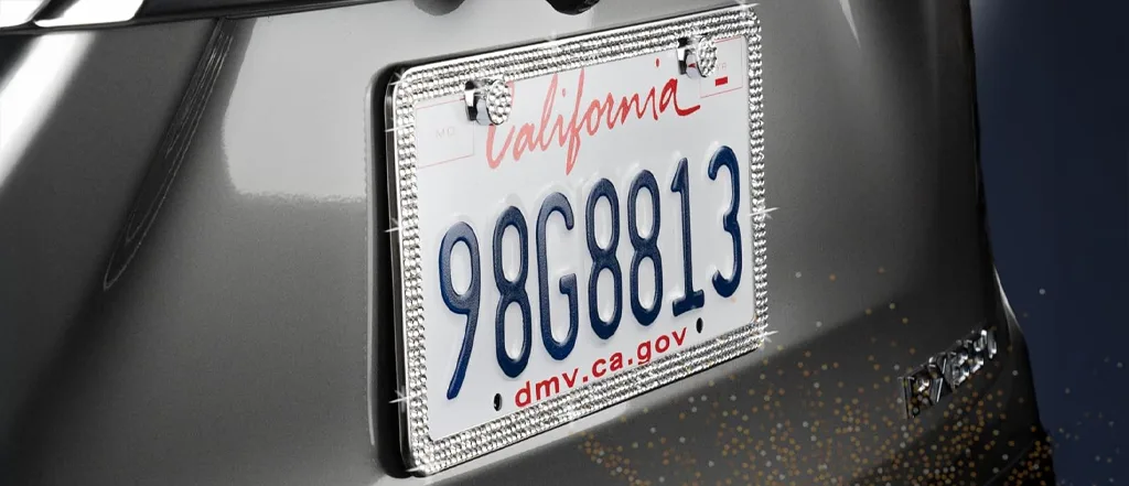 The Bling: Rhinestone License Plate Frame on white background